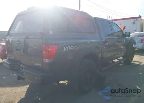 2012 Nissan Titan Pro-4X из США, поврежденный, VIN 1N6BA0ECXCN319211